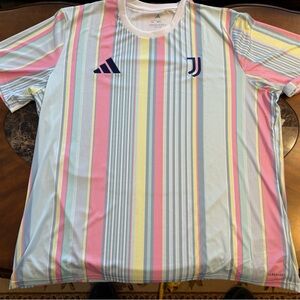 White and pink Juventus 2022/23 soccer jersey